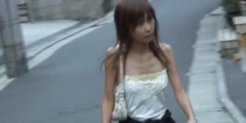 Slim Japanese girlie gets boob sharked on the street.