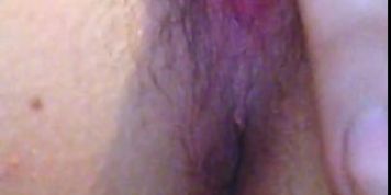 Fingering a hairy pussy