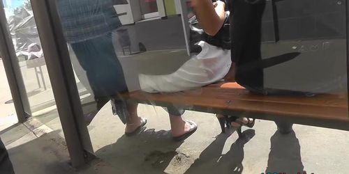 Cute upskirt cutie on a but stop